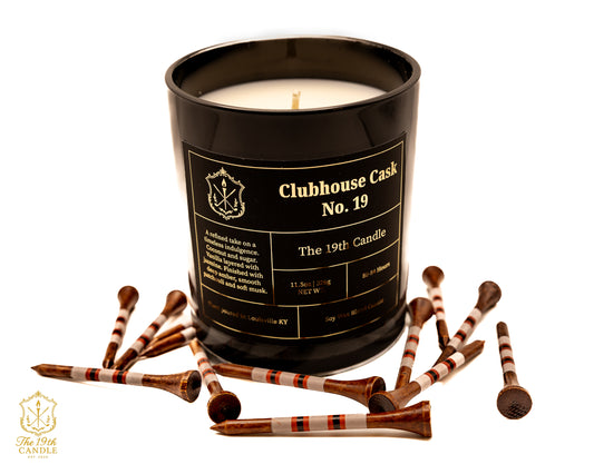 Clubhouse Cask No. 19 ambered vanilla luxury candle in 13.5 oz glass vessel with golf tees — The 19th Candle